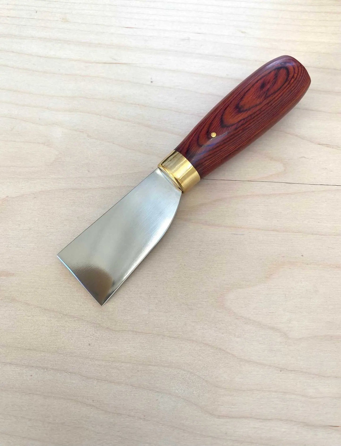 Stainless Steel Japanese Leather Skiving Knife with Wooden Handle for Leather Craftsmanship.