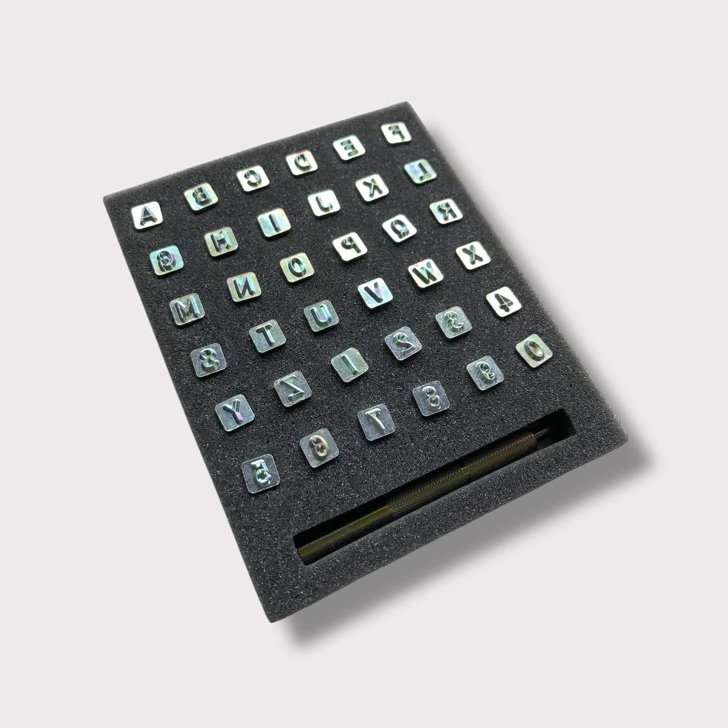 Alphabet leather stamping set.