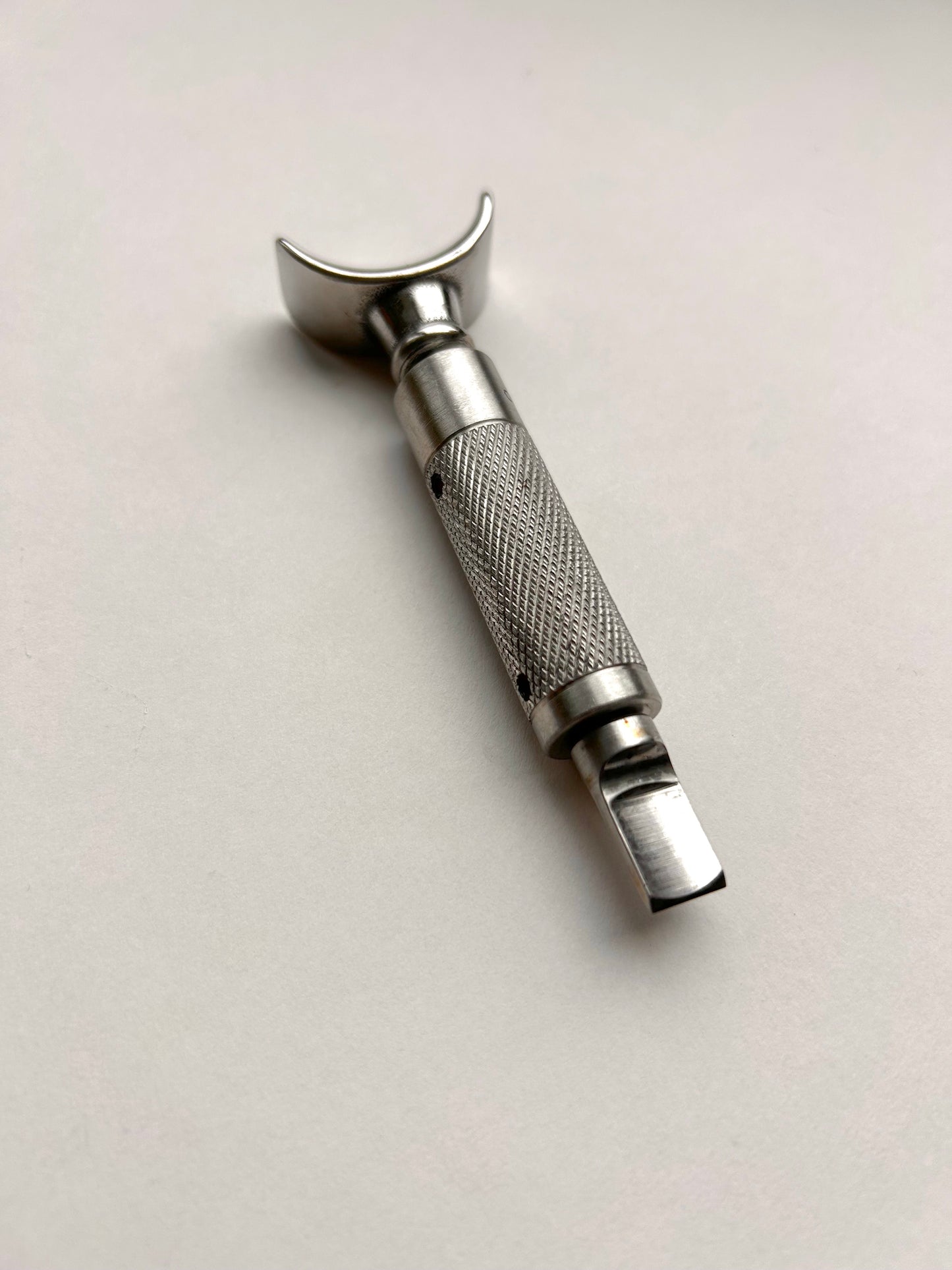Leather carving swivel knife tool in silver colour stainless steel.