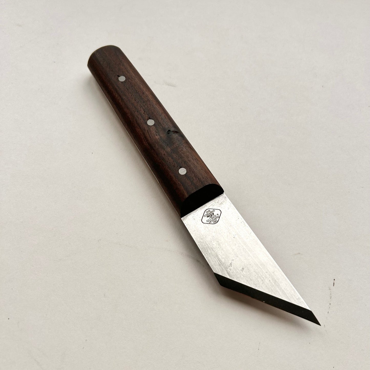 Knife with a wooden handle on a white background