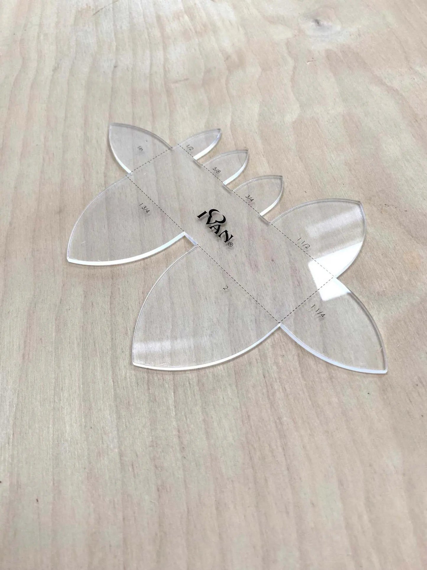 Leather Belt End Template made from precision-cut acrylic for leather crafting.