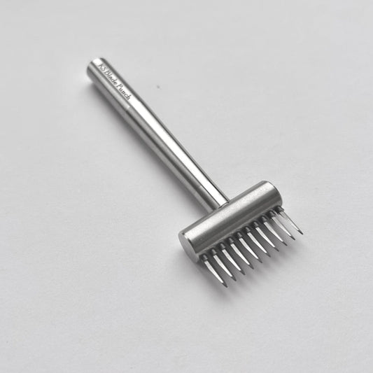 KS Blade Punch tool in silver colour on a white background