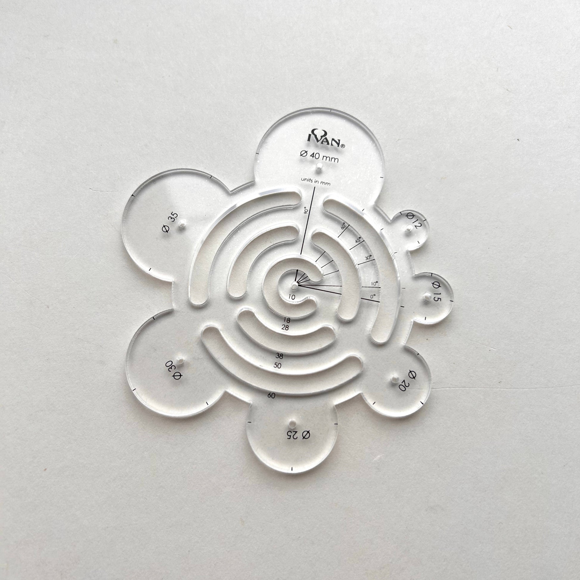 Clear plastic leather template on a white background