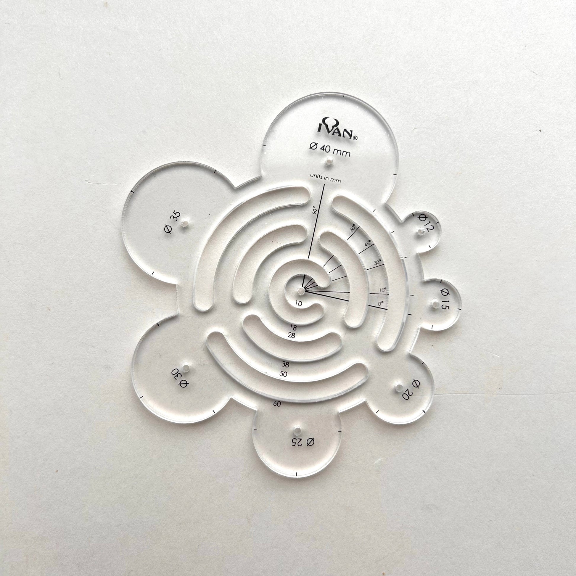 Clear plastic leather template on a white background