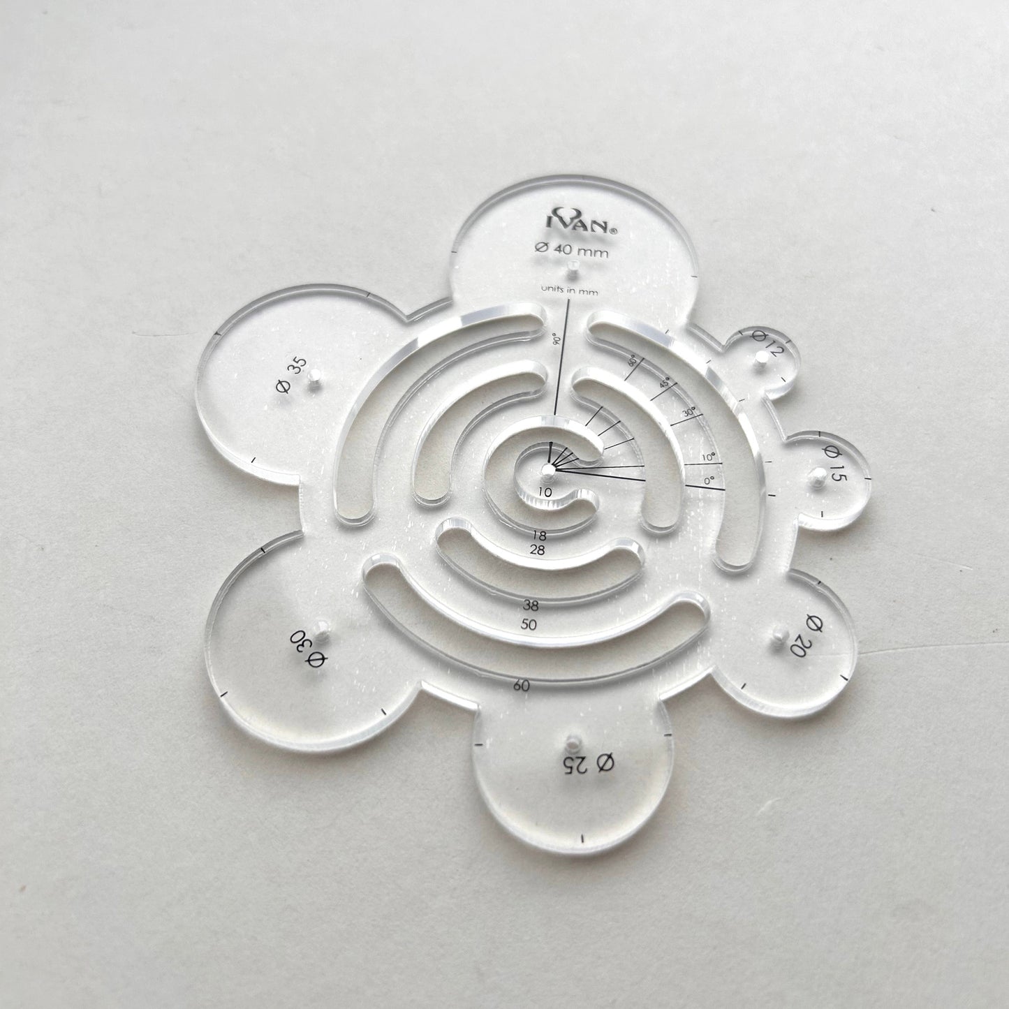 Clear plastic leather template on a white background