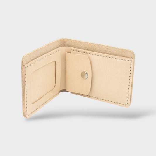 Beige leather wallet on a light gray background