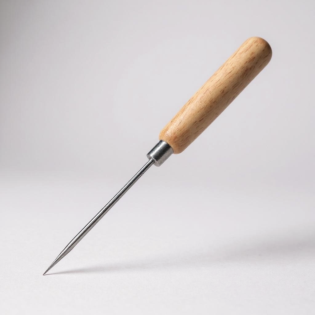 Wooden-handled leather scratch awl tool on a light grey background