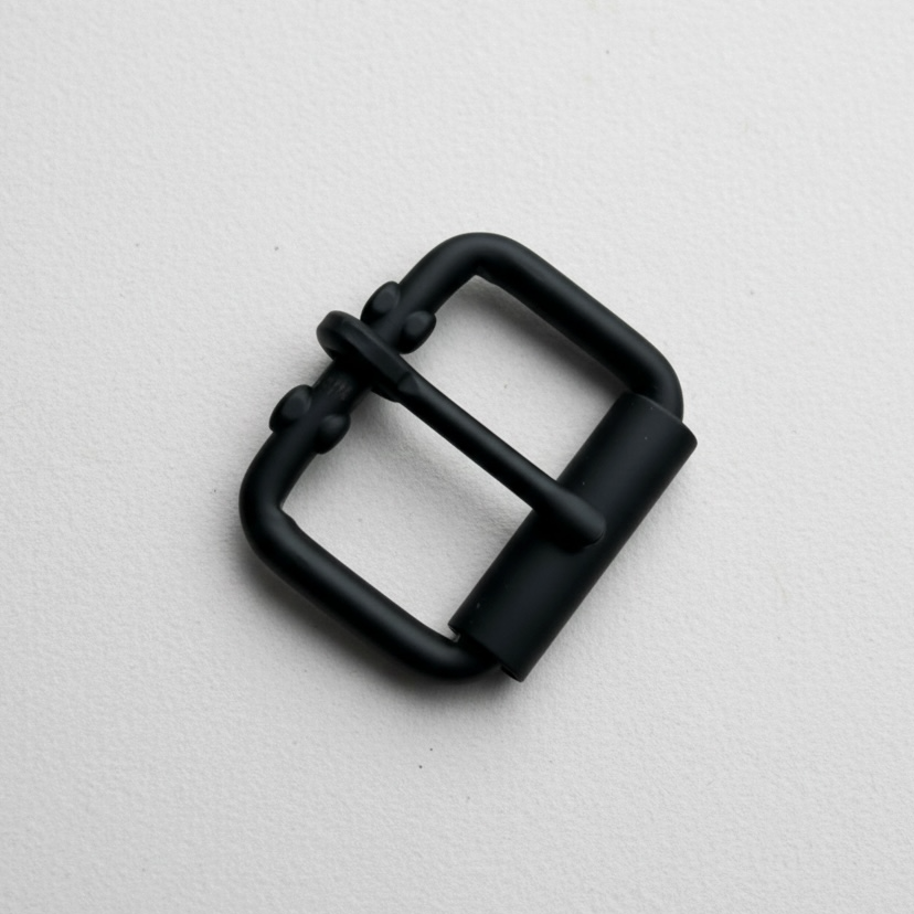 Matte black roller buckle on white background