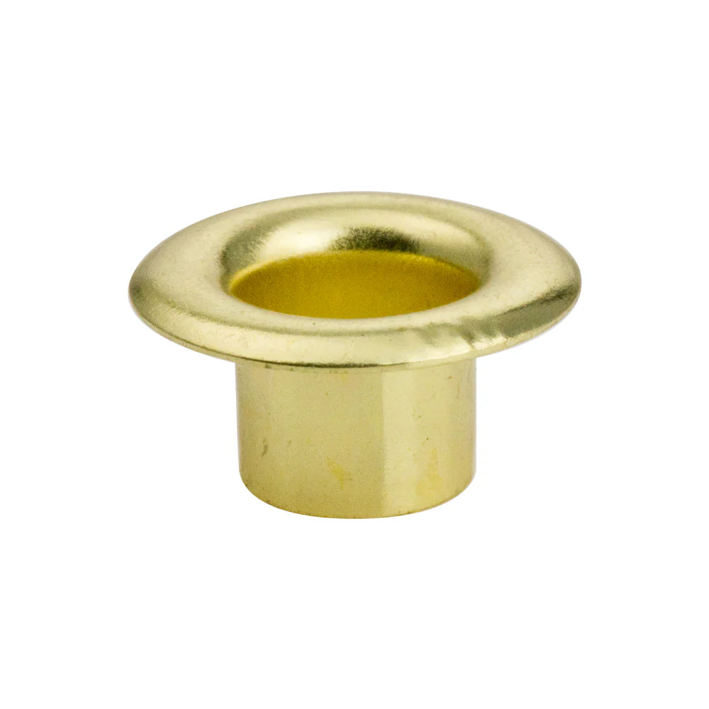 Brass eyelets on a white background