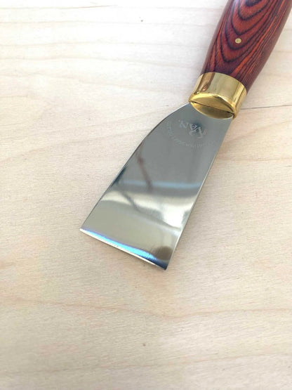 Stainless Steel Japanese Leather Skiving Knife with ergonomic wood handle for leather craftsmen.