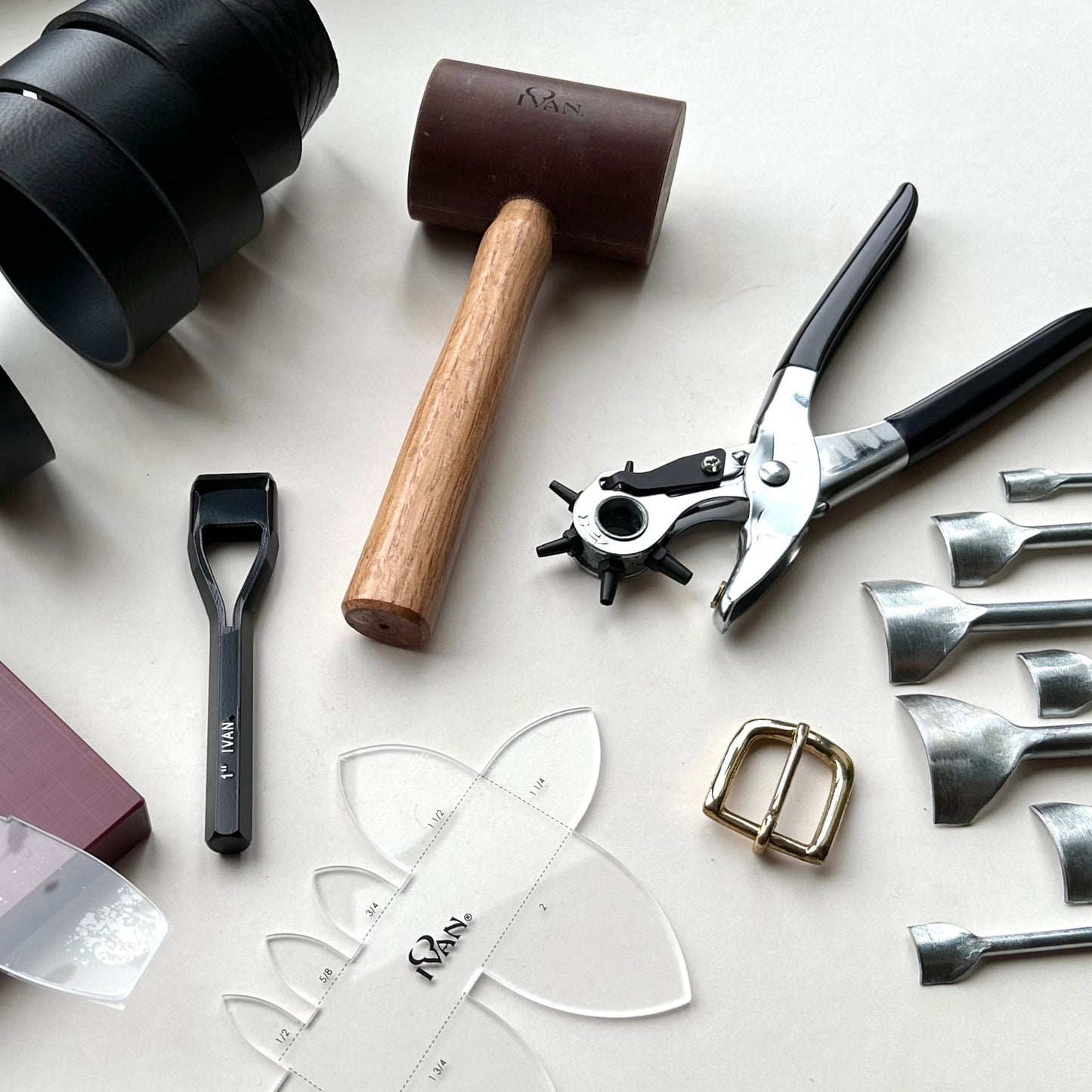 Collection of tools and materials on a white surface