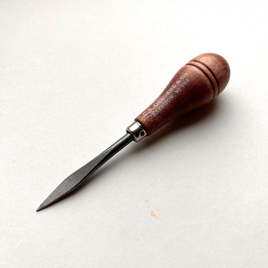 CS Osborne wooden-handled belt awl on a white background