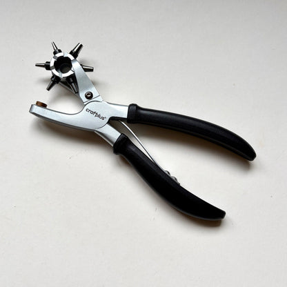 Craftplus Rotary hole punch on a grey background