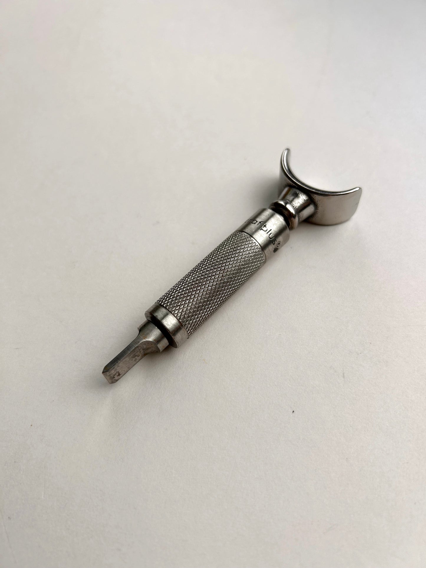 Leather carving swivel knife tool in silver colour stainless steel.