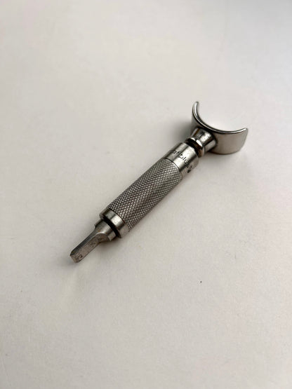 Leather carving swivel knife tool in silver colour stainless steel.