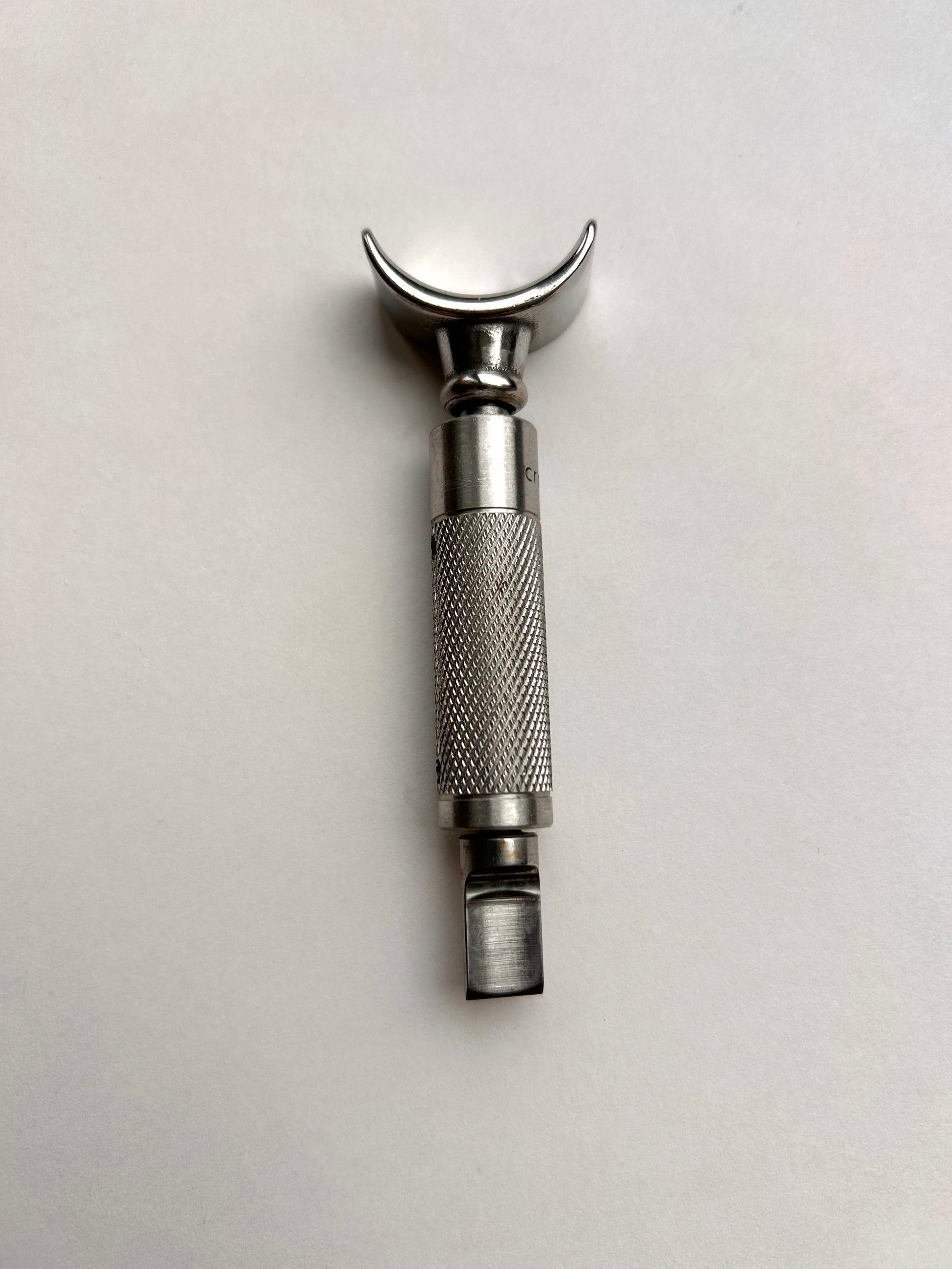 Leather carving swivel knife tool in silver colour stainless steel.