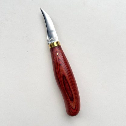 Wooden-handled clicker knife for leather with metal blade on a white background