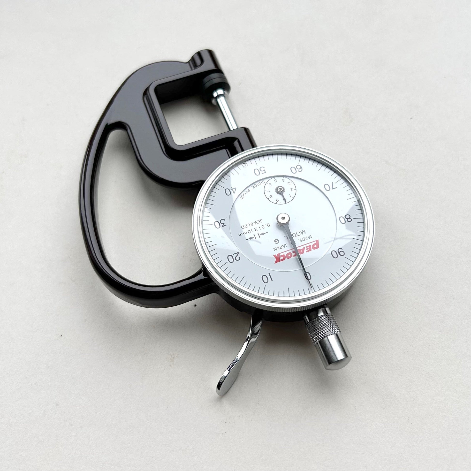 Dial Thickness Gauge for Leather on white background