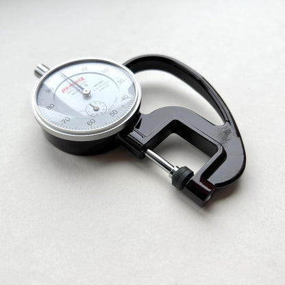 Dial Thickness Gauge for Leather on white background