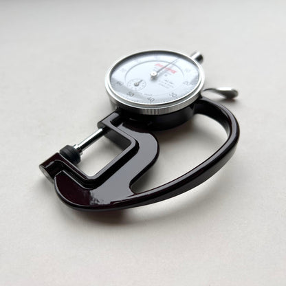 Dial Thickness Gauge for Leather on white background