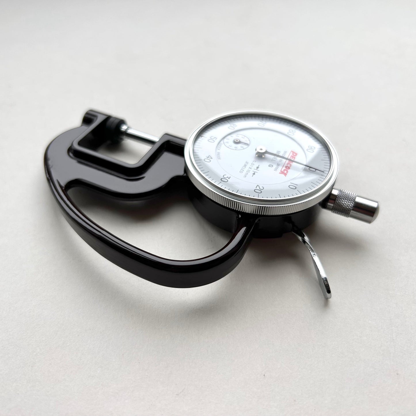 Dial Thickness Gauge for Leather on white background