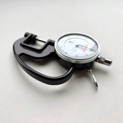 Dial Thickness Gauge for Leather on white background