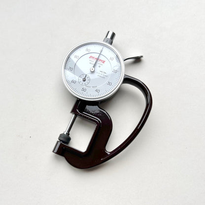 Dial Thickness Gauge for Leather on white background