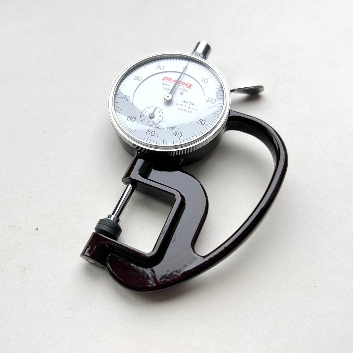 Dial Thickness Gauge for Leather on white background