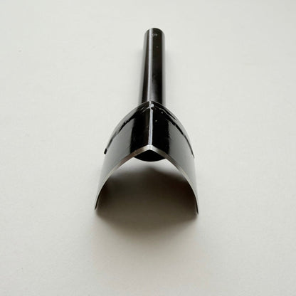 A black metal strap end punch with a long shank, photographed on a plain light grey background.