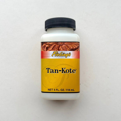 Bottle of Tan-Kote on a white background