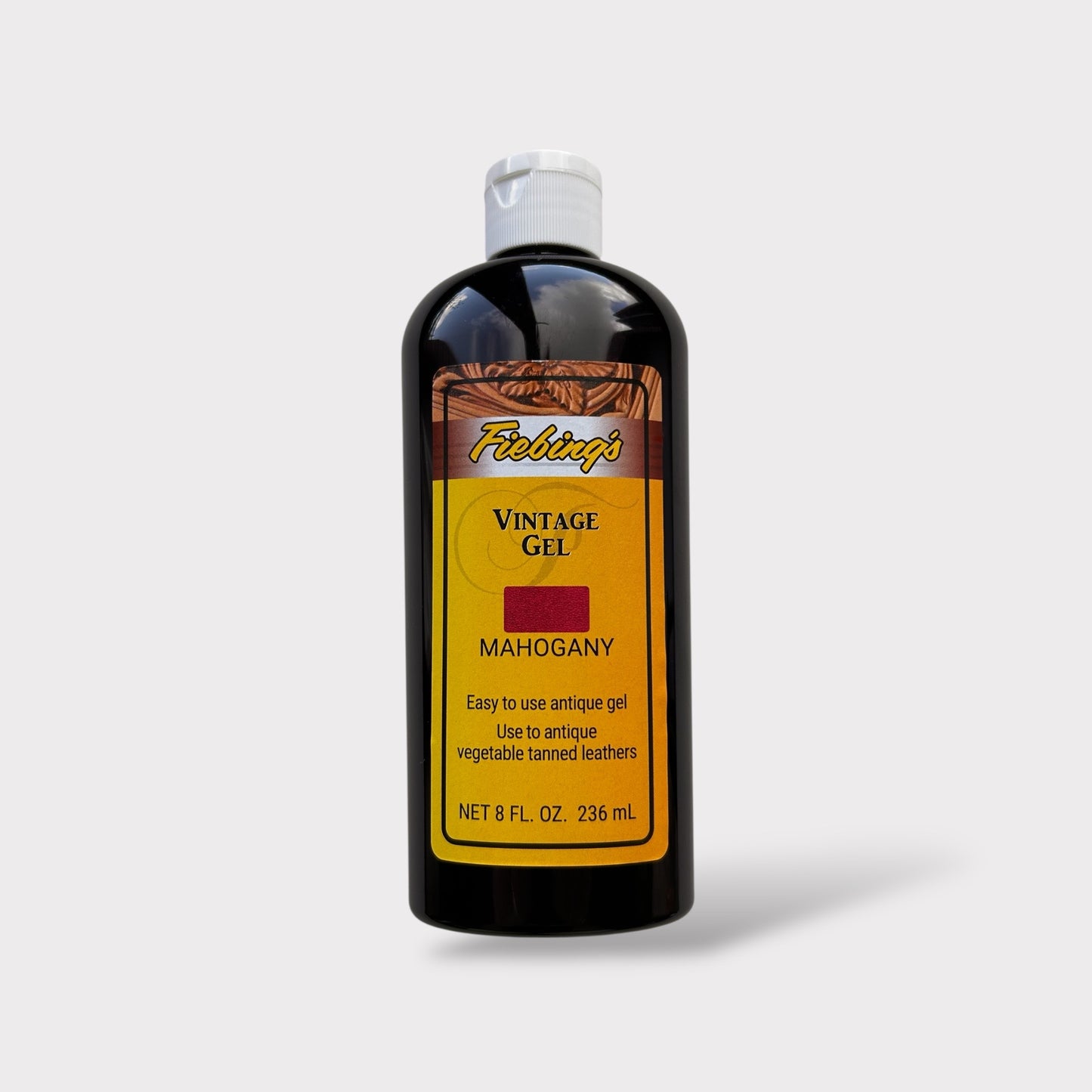 Bottle of Fiebing's Vintage Gel Mahogany on a light gray background