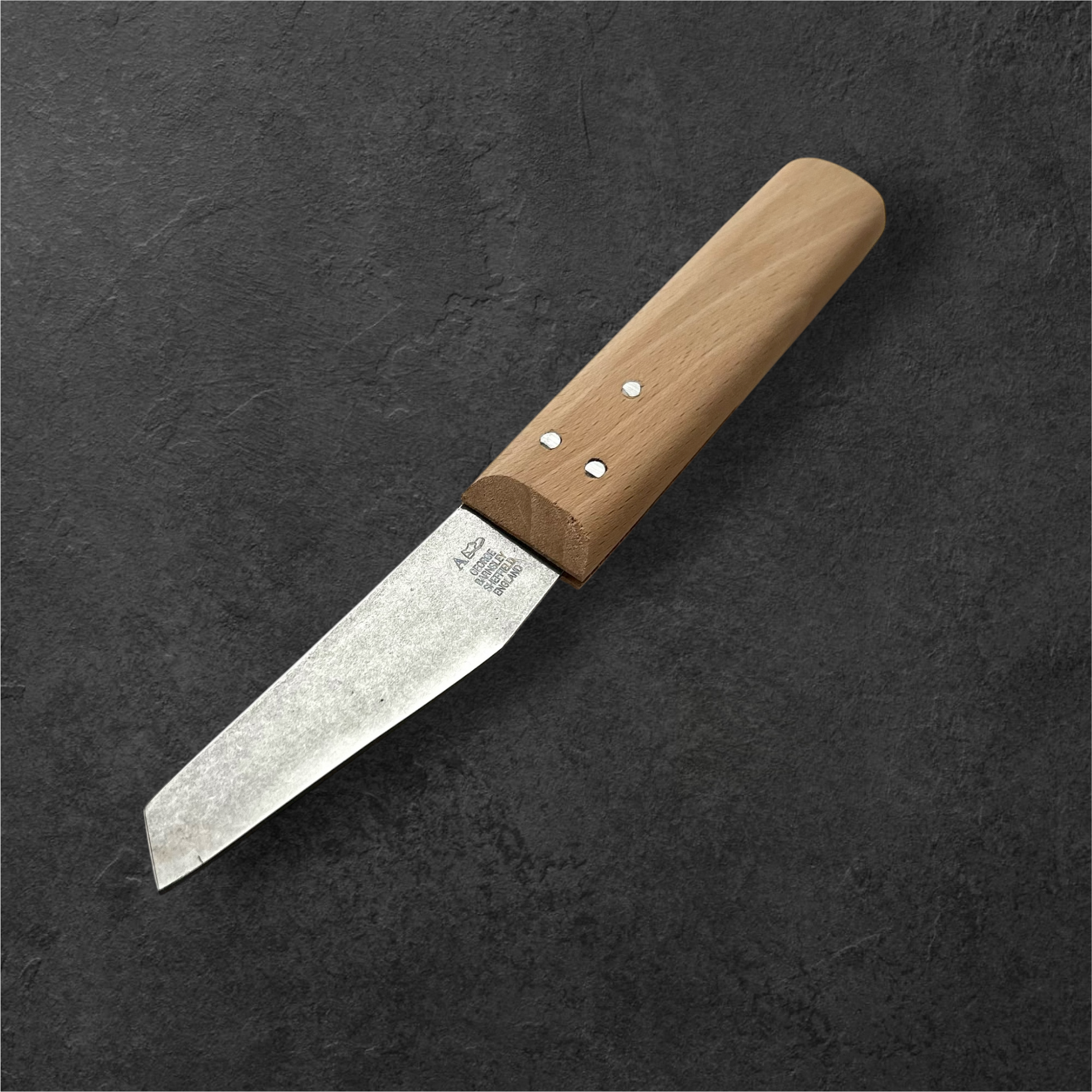 Knife with wooden handle on a dark gray background