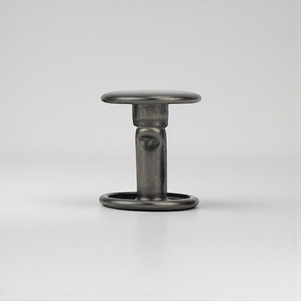 Metal rivet for leather on a white background