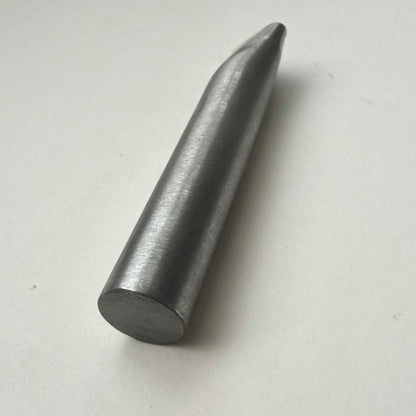 A metallic oblong punch for leather on a white background