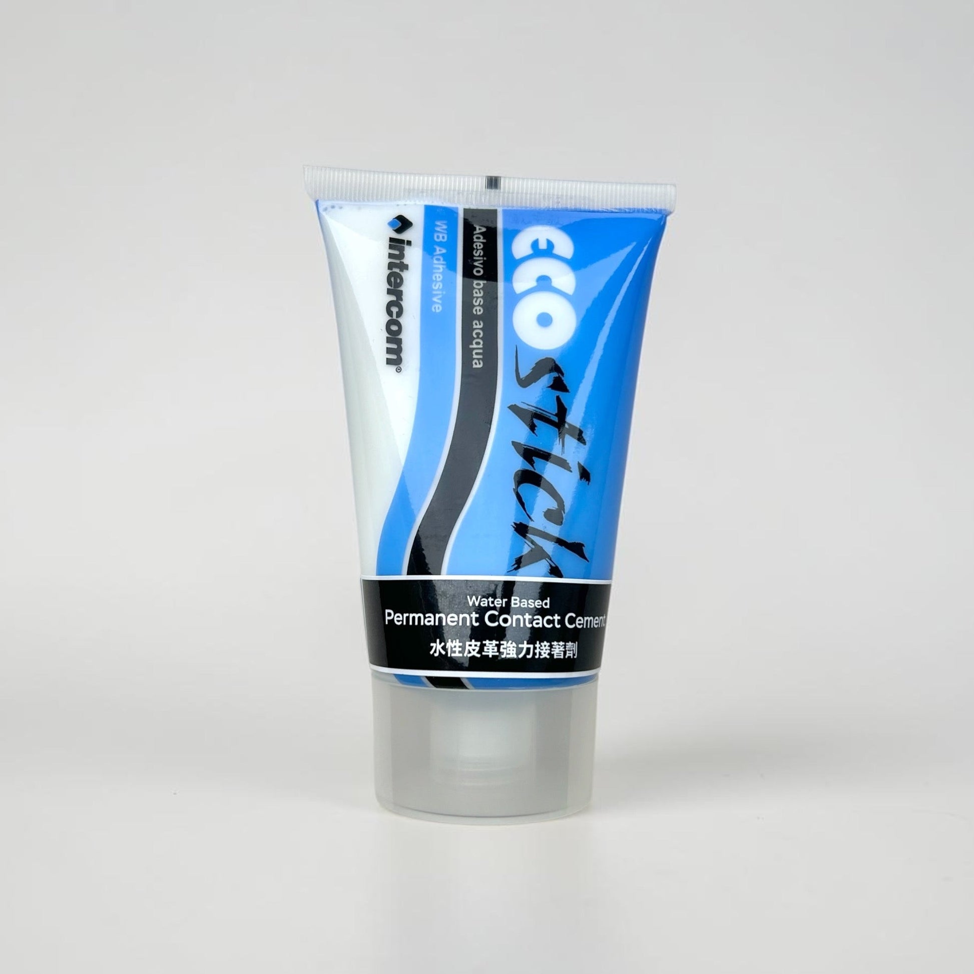 Tube of leather glue with blue and white label on a gray background