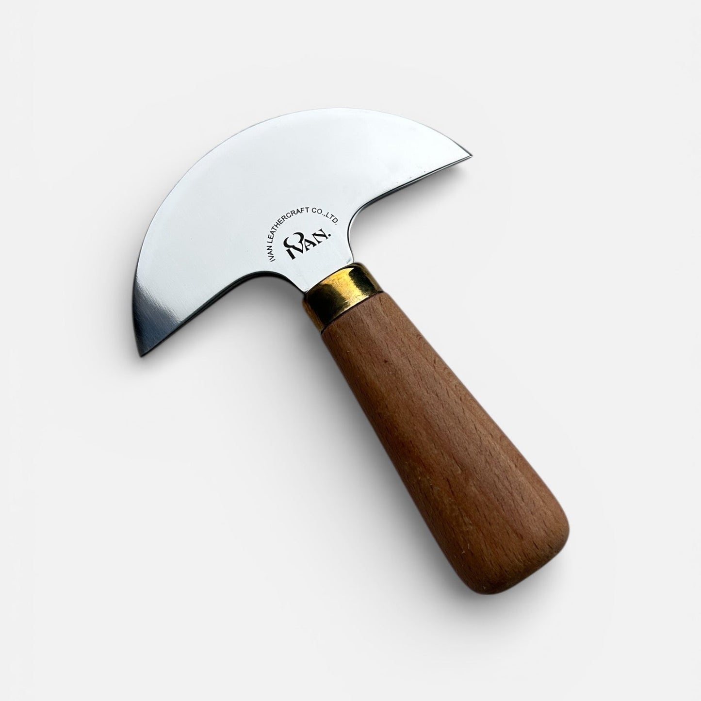 Small round head leather knife with a wooden handle on a white background