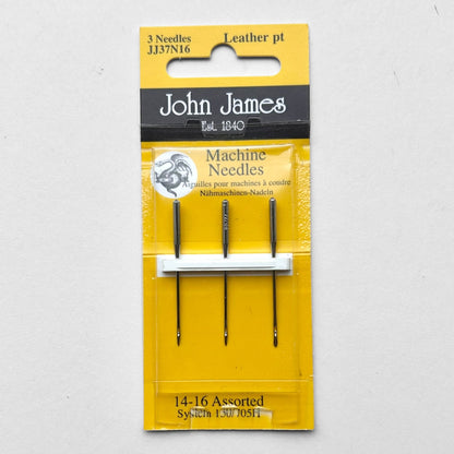 Packaged John James sewing machine needles on a grey background
