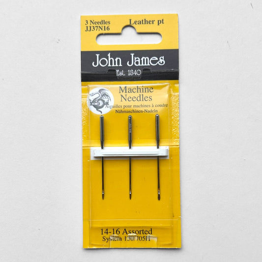 Packaged John James sewing machine needles on a grey background