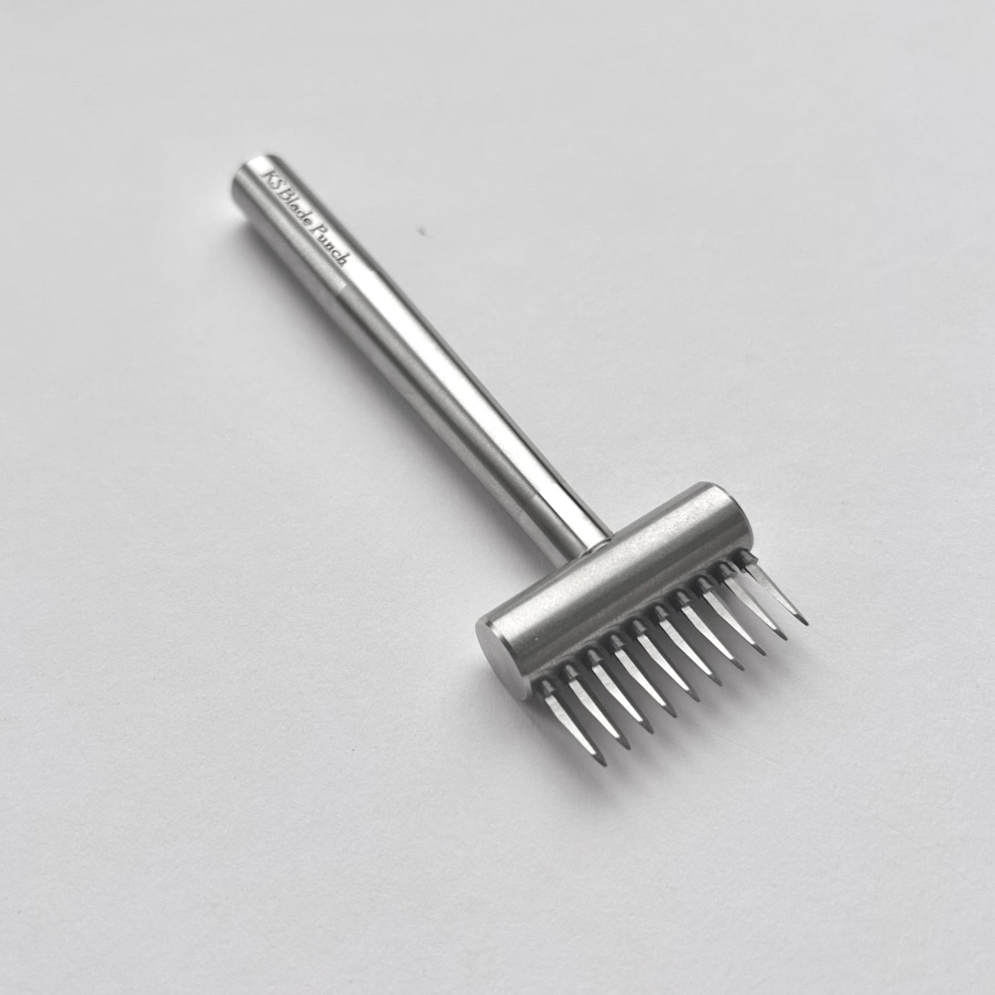 KS Blade Punch tool in silver colour on a white background