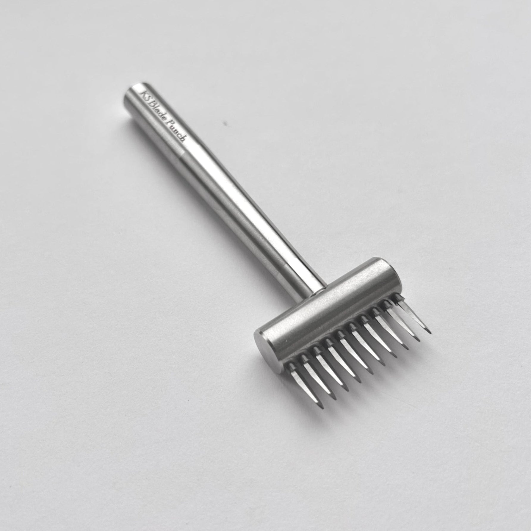 KS Blade Punch tool in silver colour on a white background
