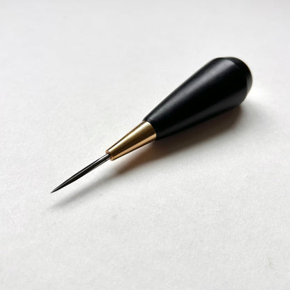Black and gold leather diamond stitching awl by Kemovancraft on a white background