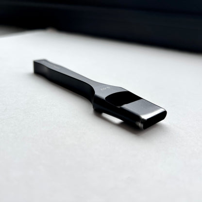 Black leather oblong slot punch tool with 'Kemovancraft' branding on a light gray background
