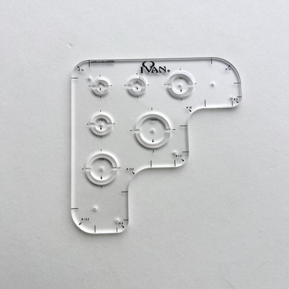 Leather wallet corner radius template on a grey background