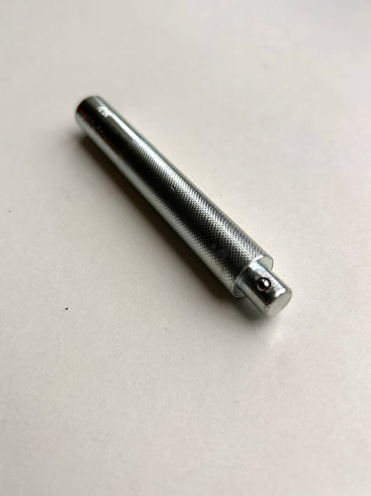 Metal leather embossing tool on a white background