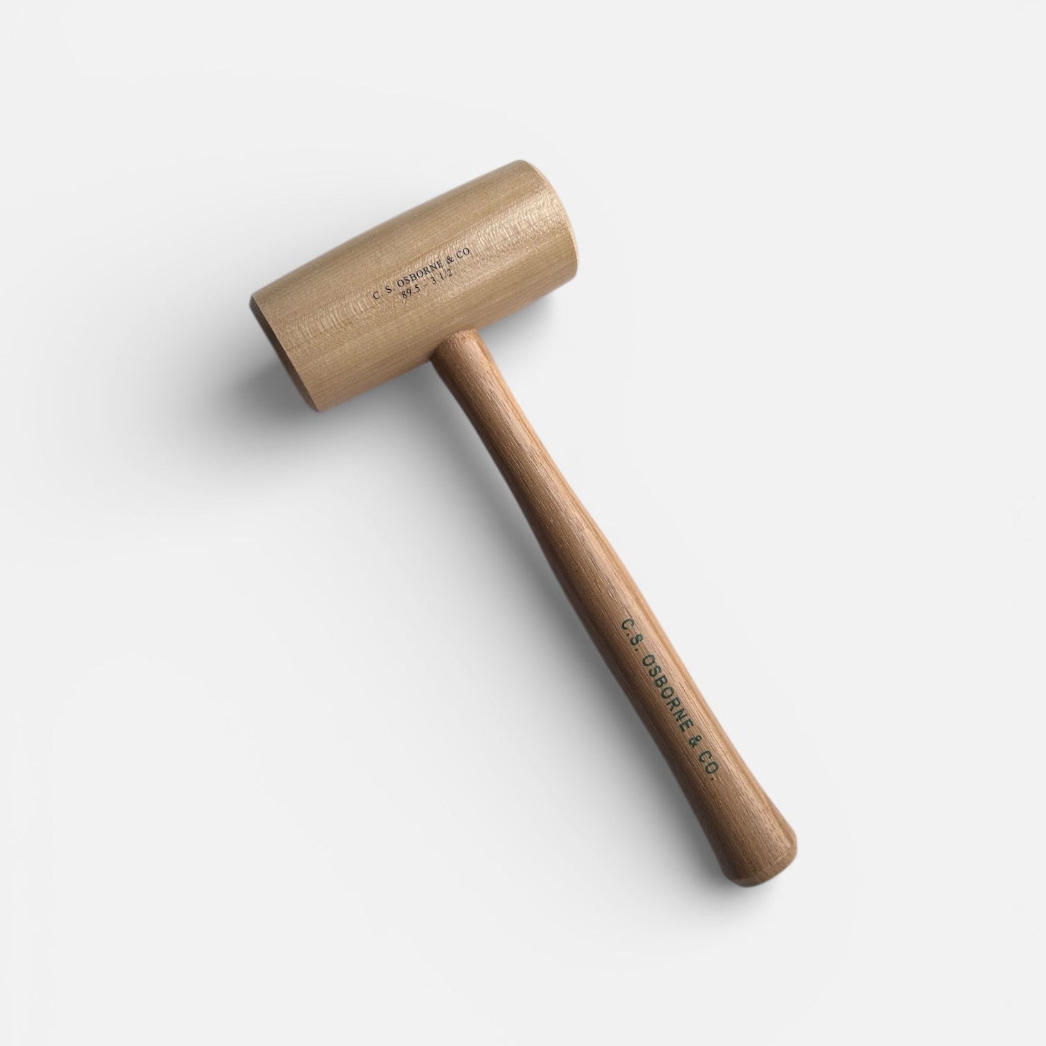Wooden mallet with a white background