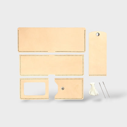 Set of beige leather wallet pieces with various compartments on a light gray background