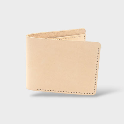 Beige leather wallet on a light gray background