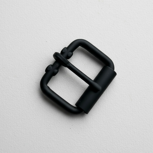 Matte black roller buckle on white background