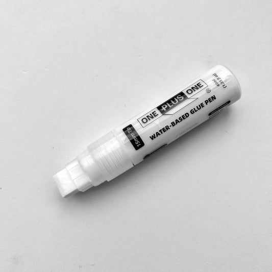 White water-based glue pen with 'One Plus One' branding on a light gray background