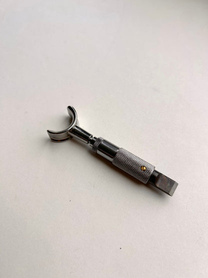 Leather carving swivel knife tool in silver colour.